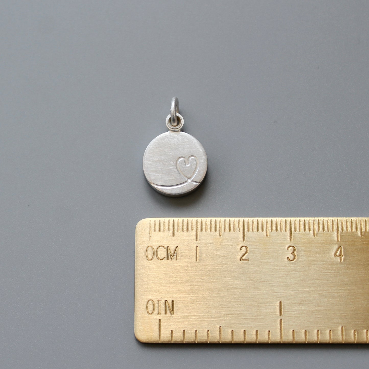 charming silver photo locket with little heart design