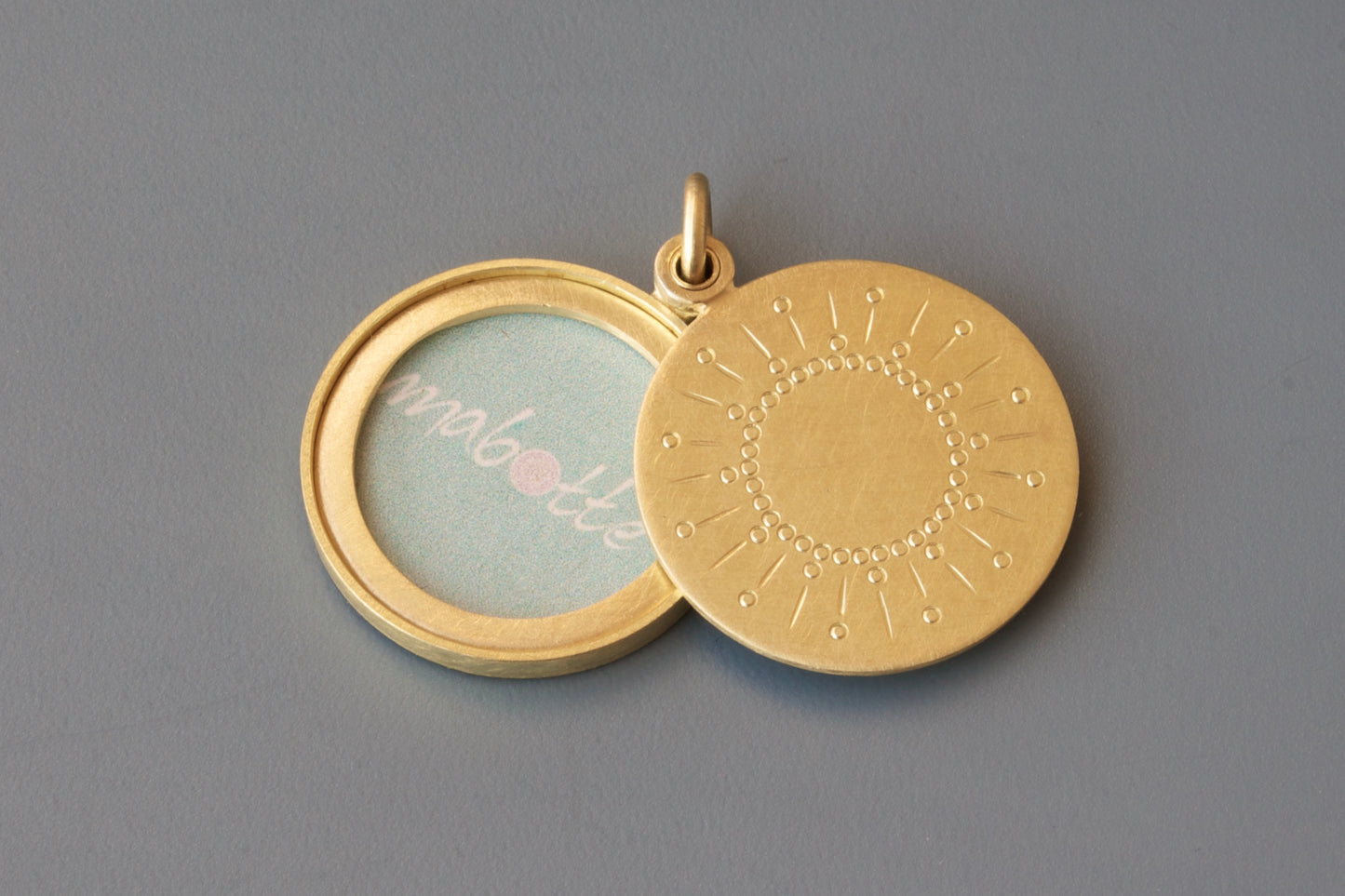beautiful golden sun locket for one photo