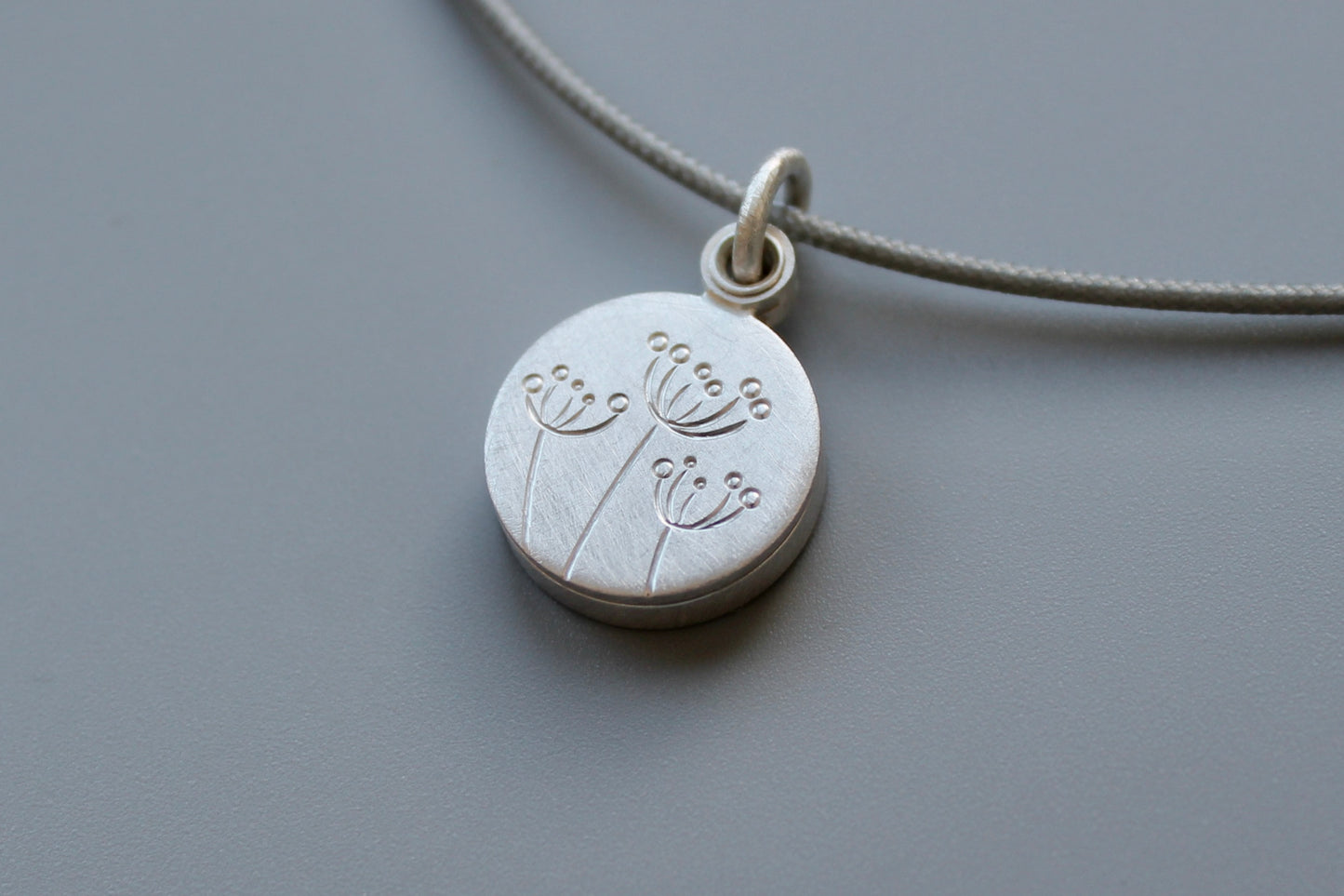 small floral locket for one picture in sterling silver