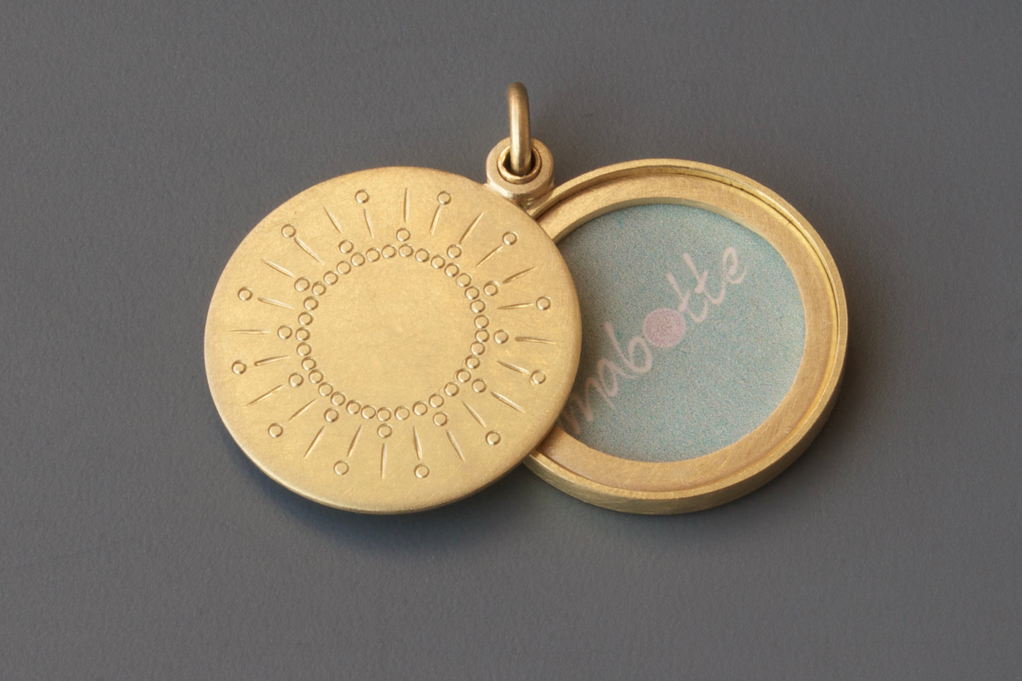 beautiful golden sun locket for one photo