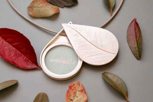 large drop shaped picture locket installing silver with leaf design