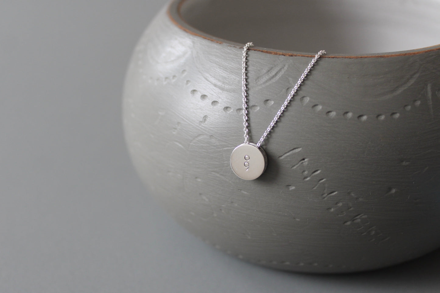 minimalist pendant necklace in sterling silver with semicolon