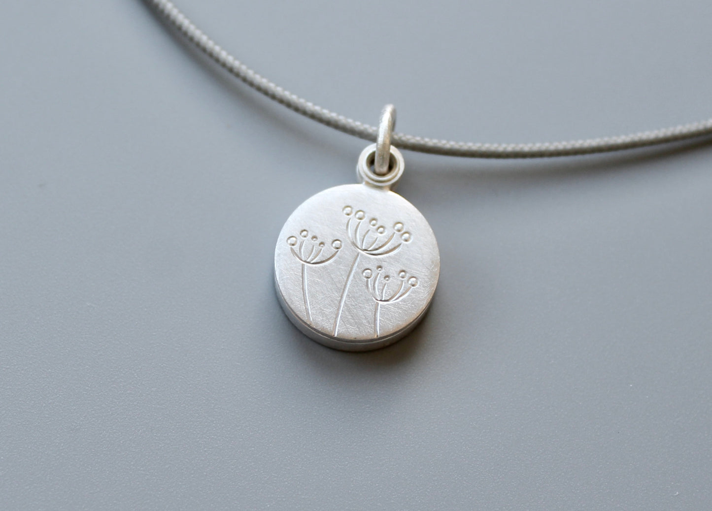 small floral locket for one picture in sterling silver