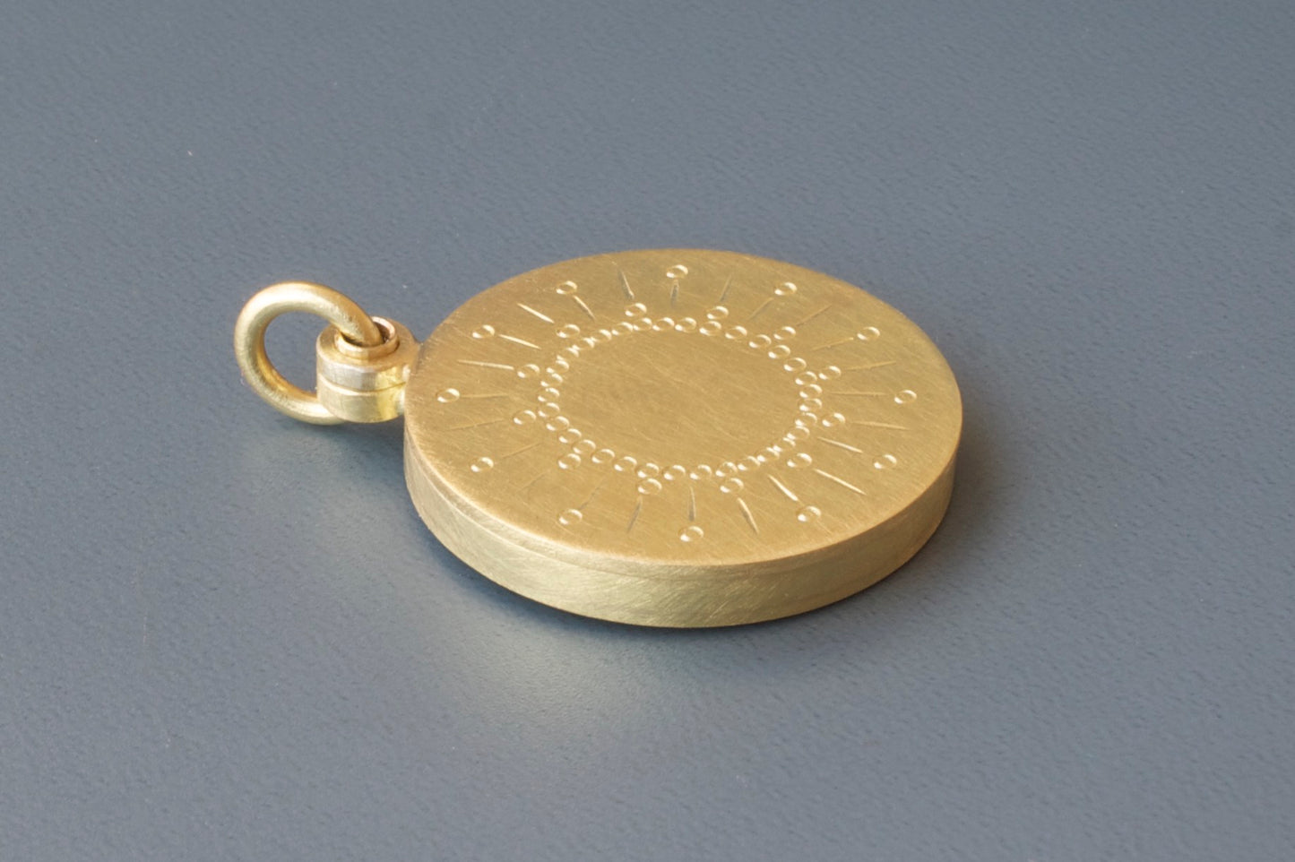 beautiful golden sun locket for one photo