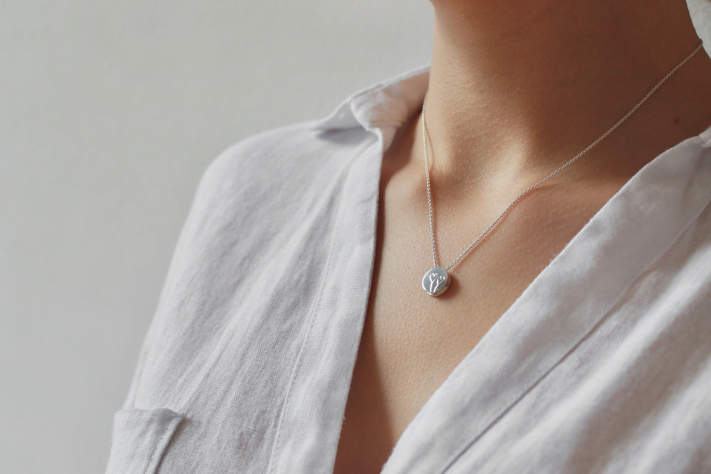 minimalist pendant necklace in sterling silver with semicolon