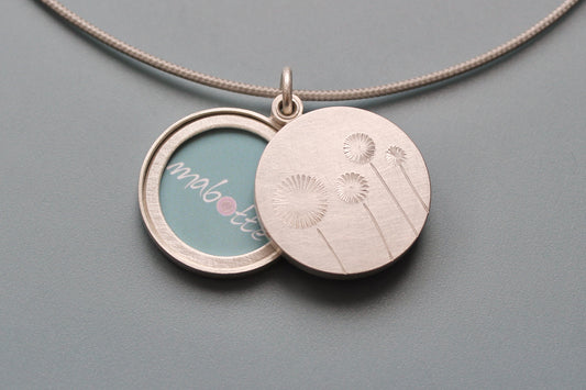 double photo locket with four dandelions in sterling silver