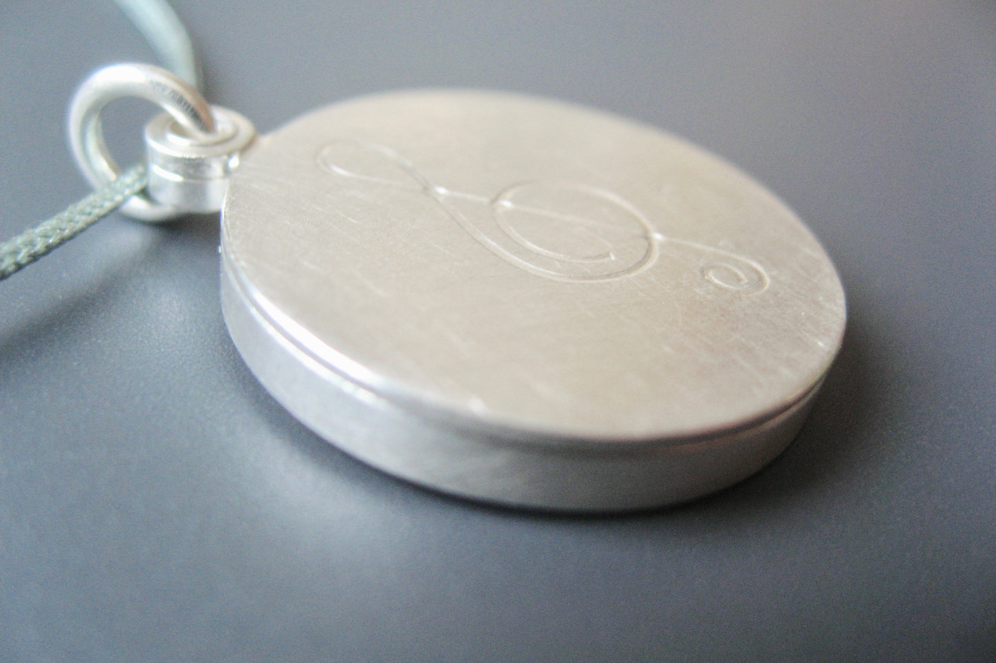 sterling silver photo locket with clef for music lovers