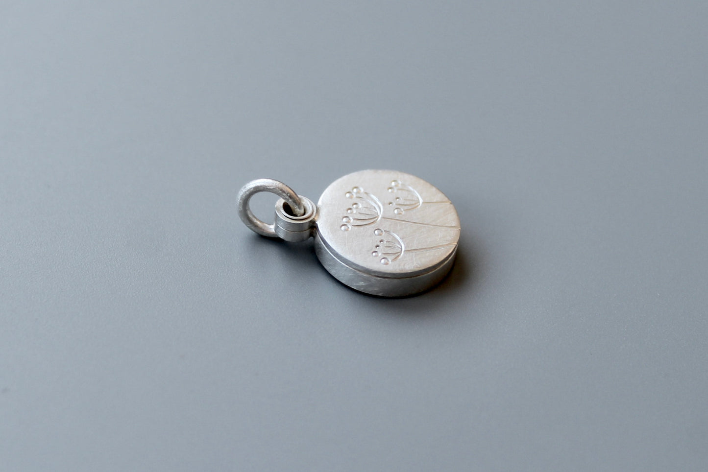 small floral locket for one picture in sterling silver