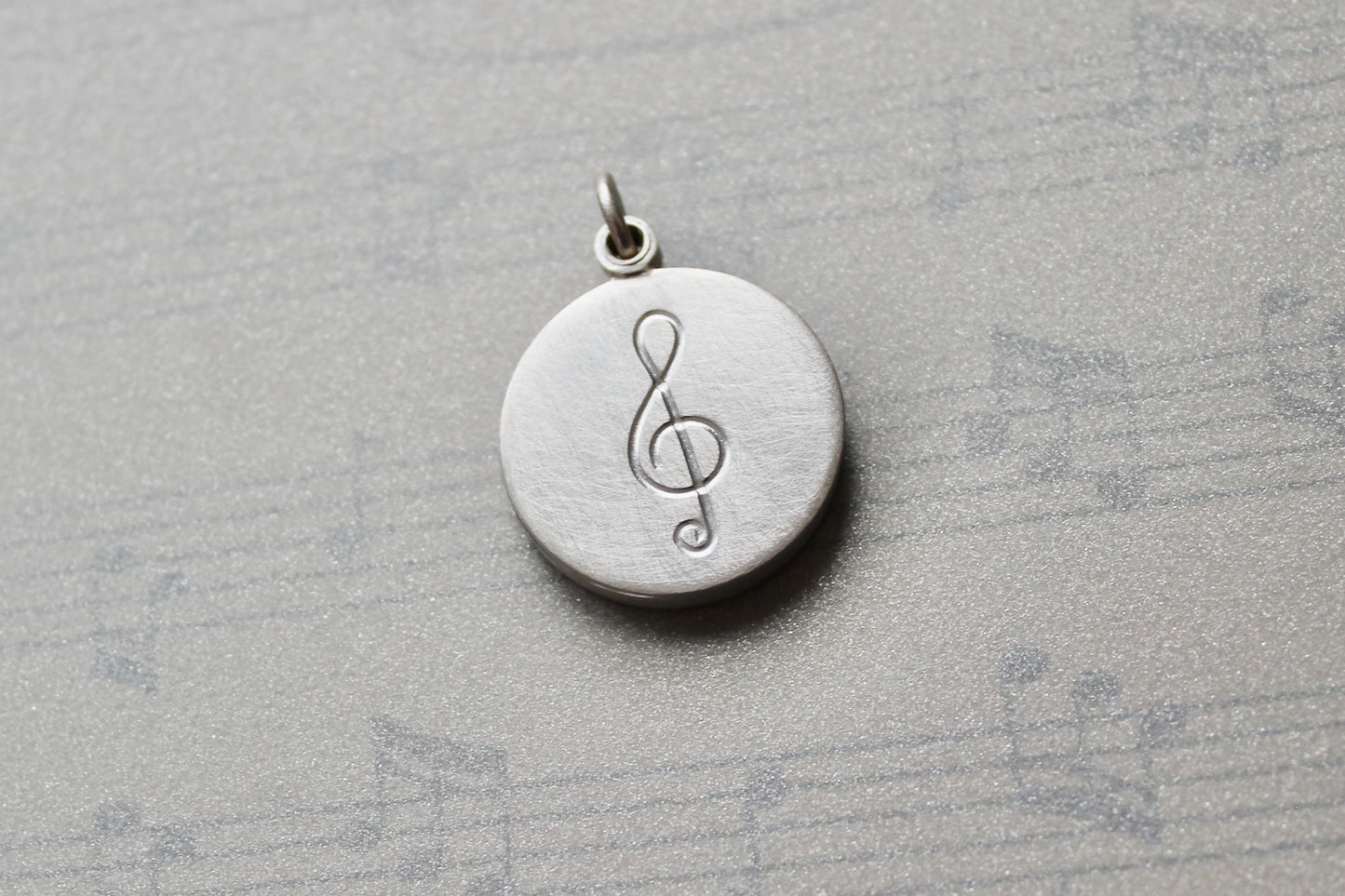 sterling silver photo locket with clef for music lovers