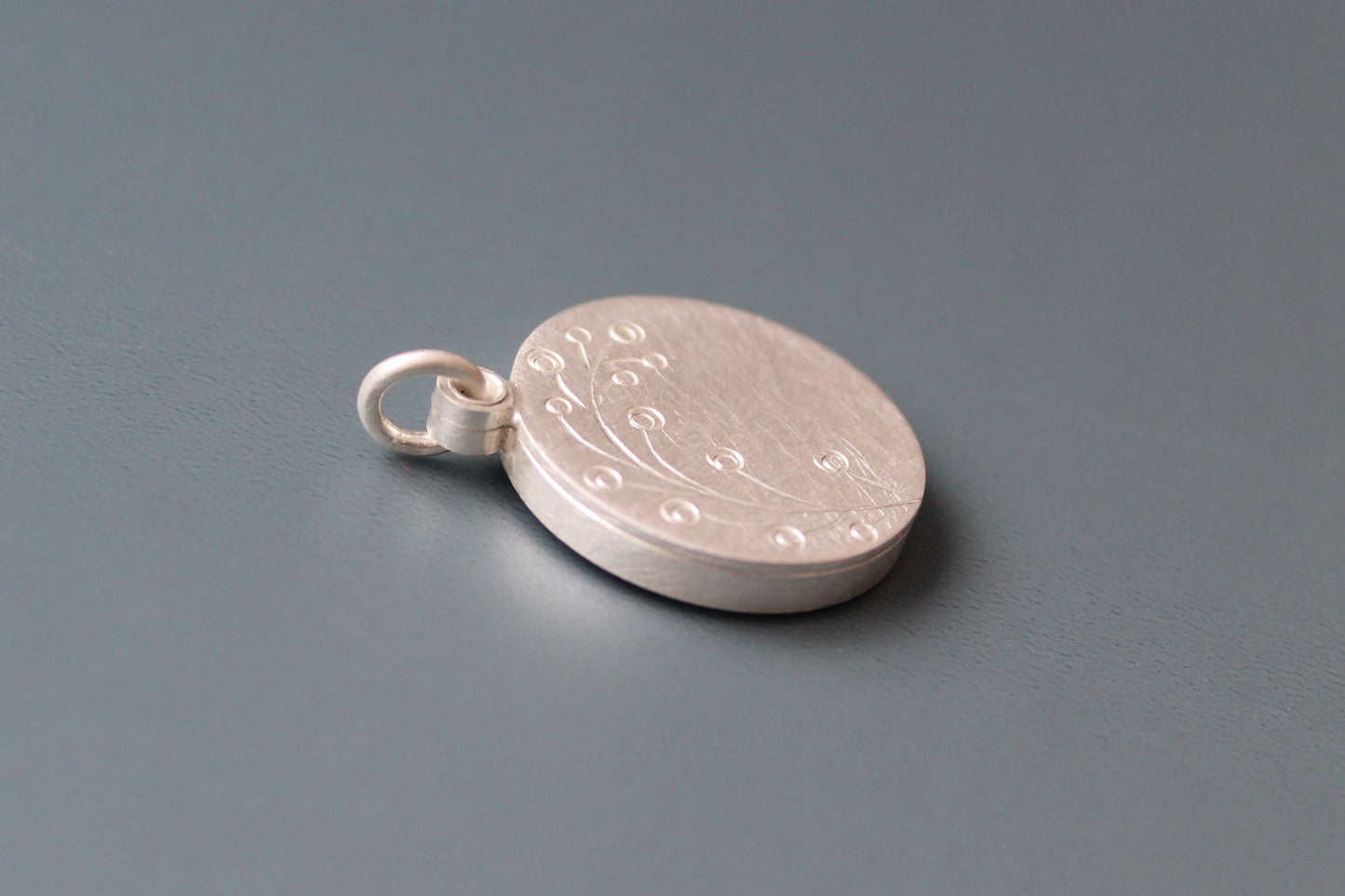 romantic handmade photo locket with twig in sterling silver