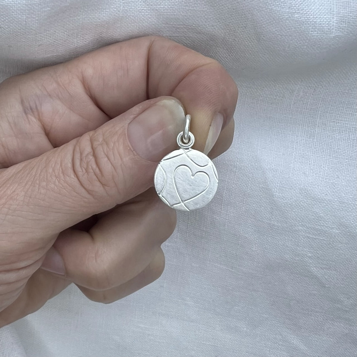 romantic picture locket with elegant heart design handmade in sterling silver