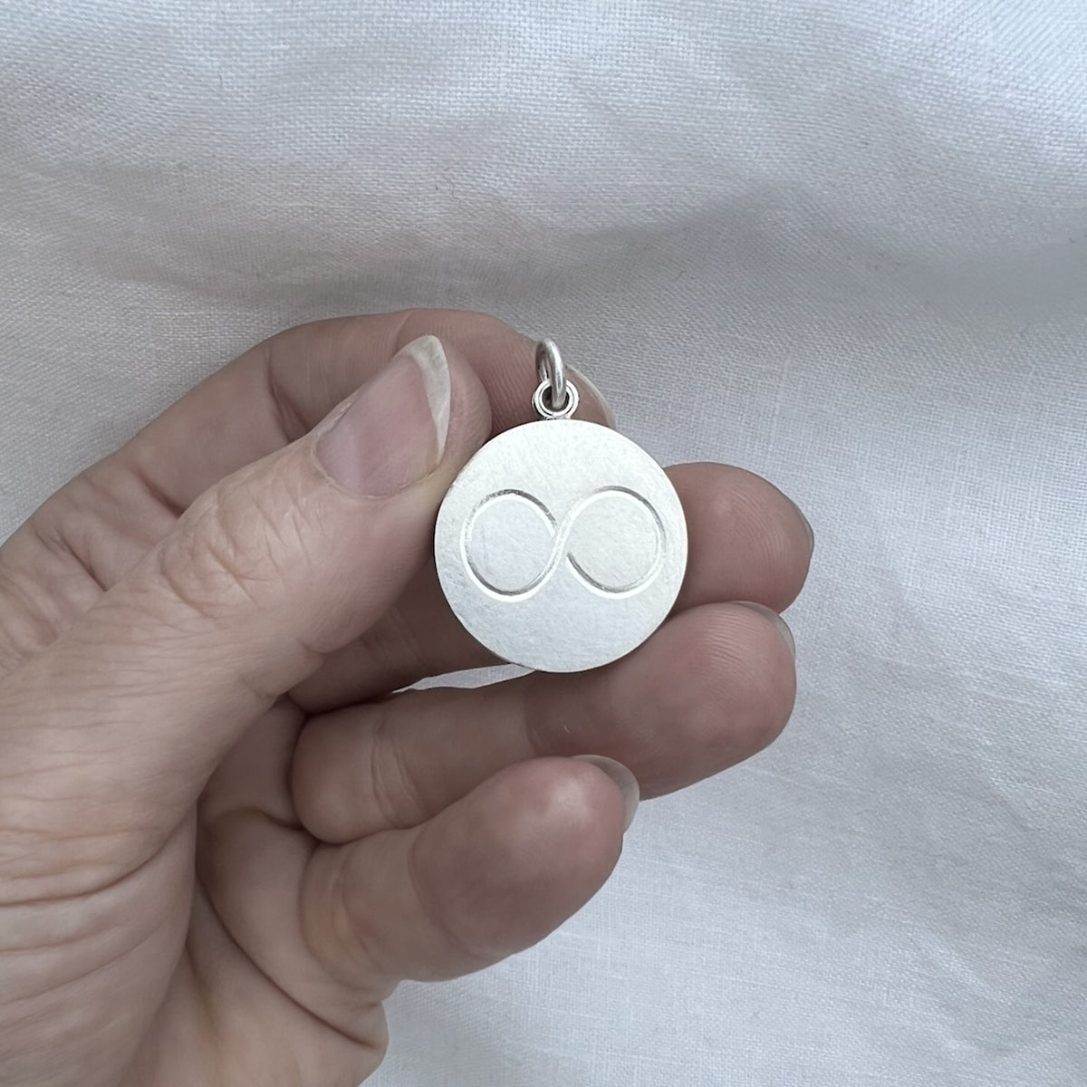 minimalist infinity locket for one picture in sterling silver
