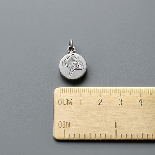 small sterling silver picture locket with gingko leaf