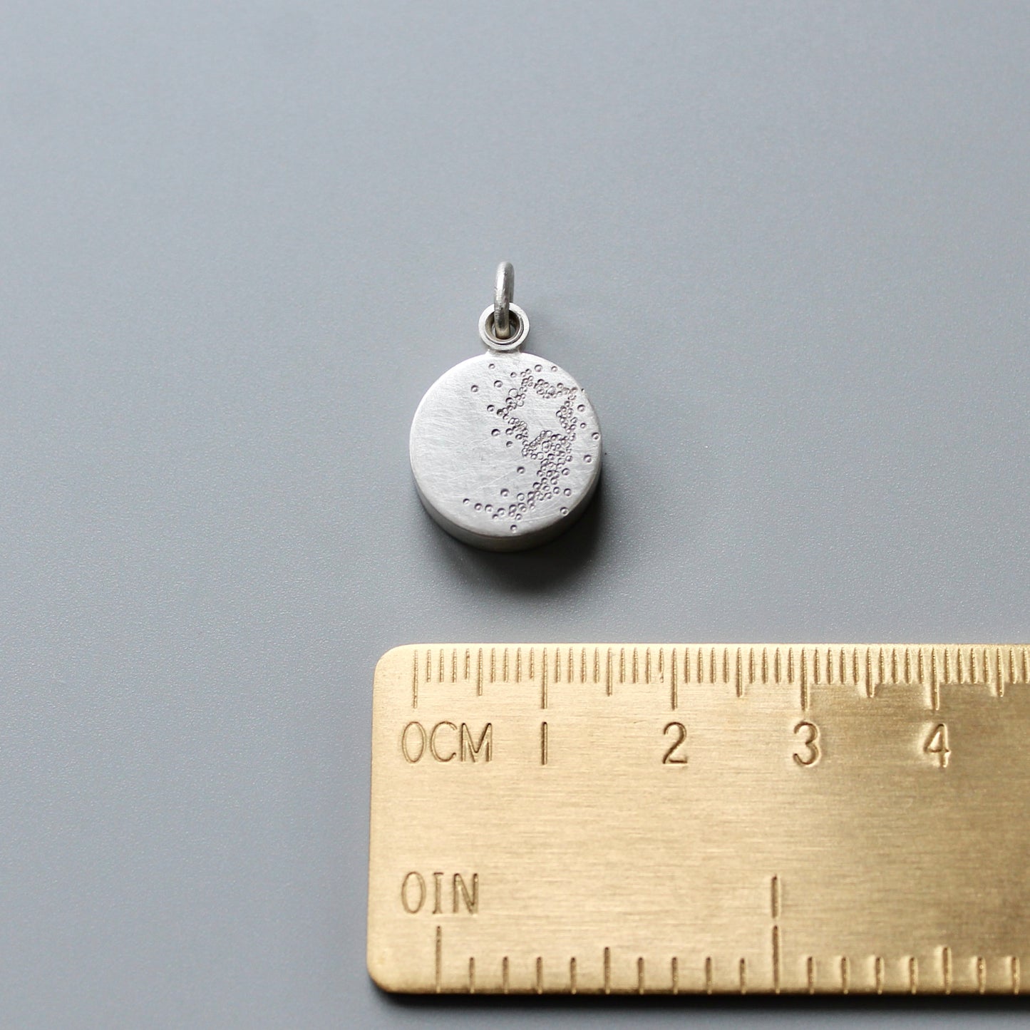 small silver locket Sun Moon and Stars with shooting star locket