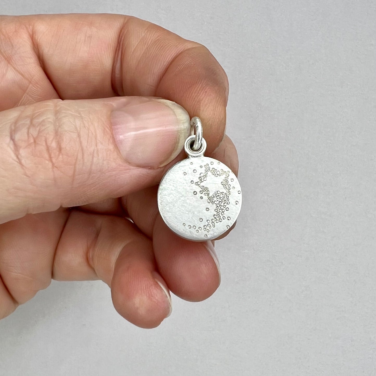 small silver locket Sun Moon and Stars with shooting star locket