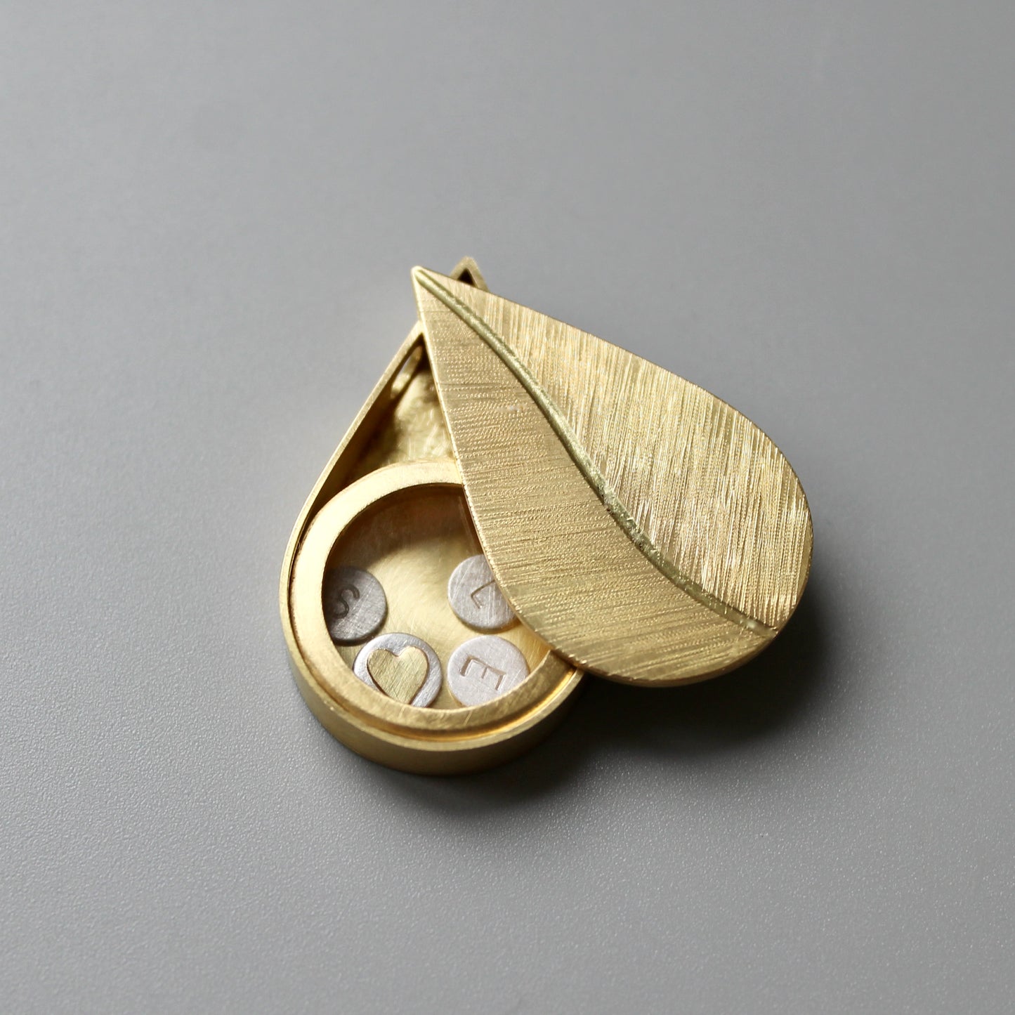 leaf necklace gold –floating charm locket in teardrop shape 18 carat yellow gold