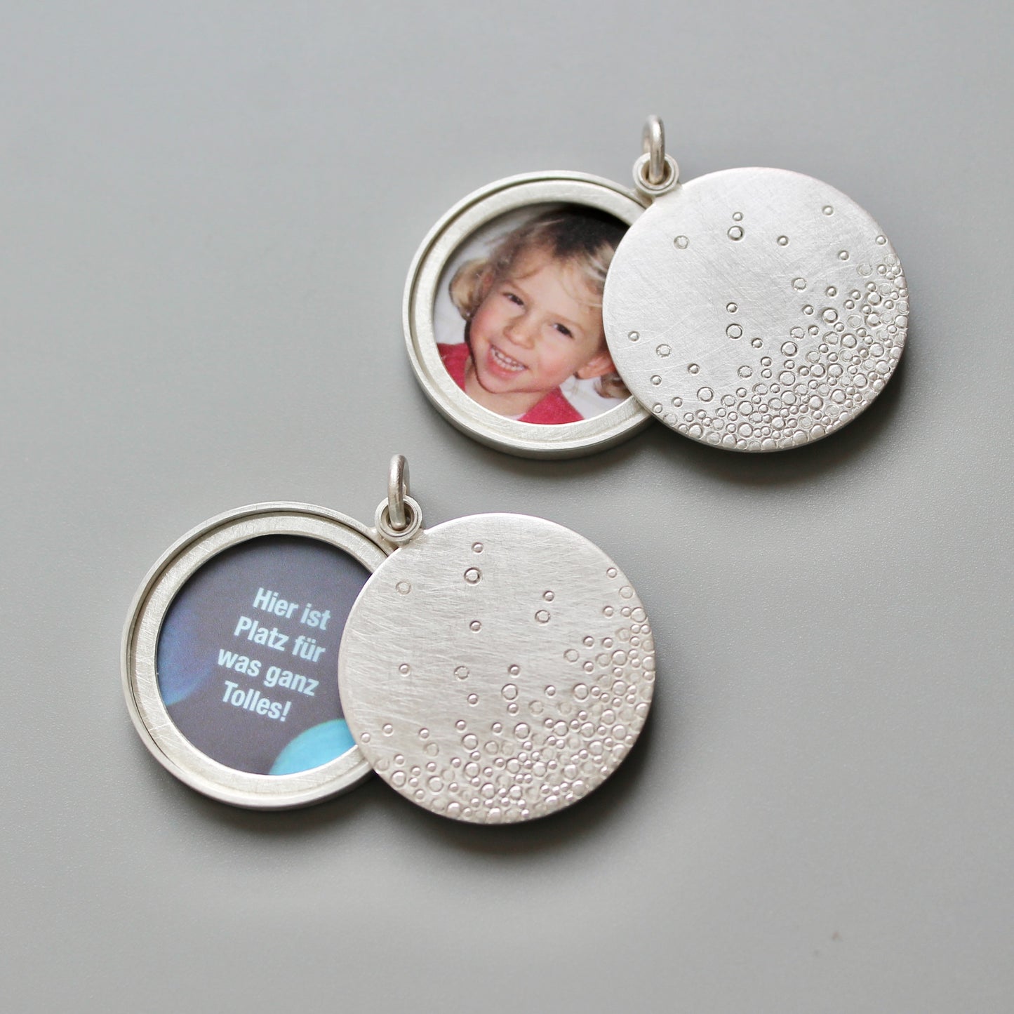 modern photo locket in sterling silver with bubbles design