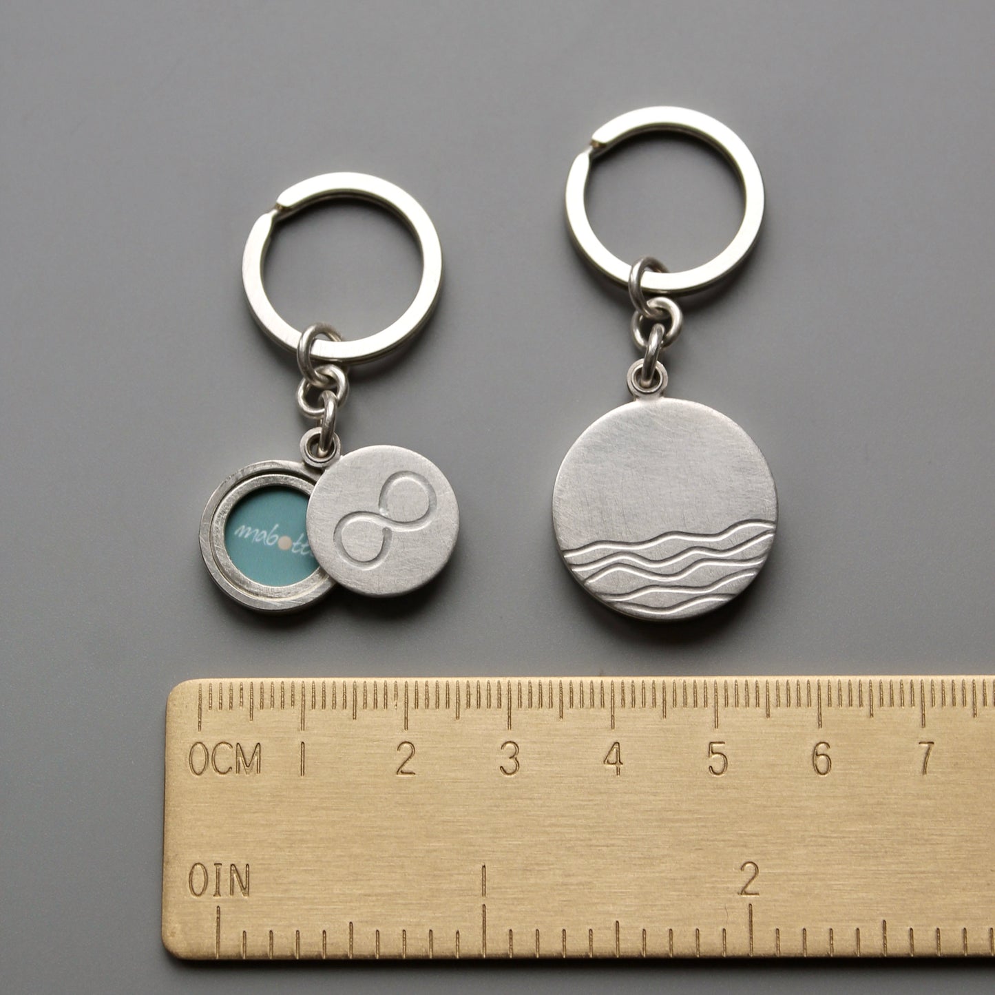 maritime sterling silver keychain locket for one photo with waves