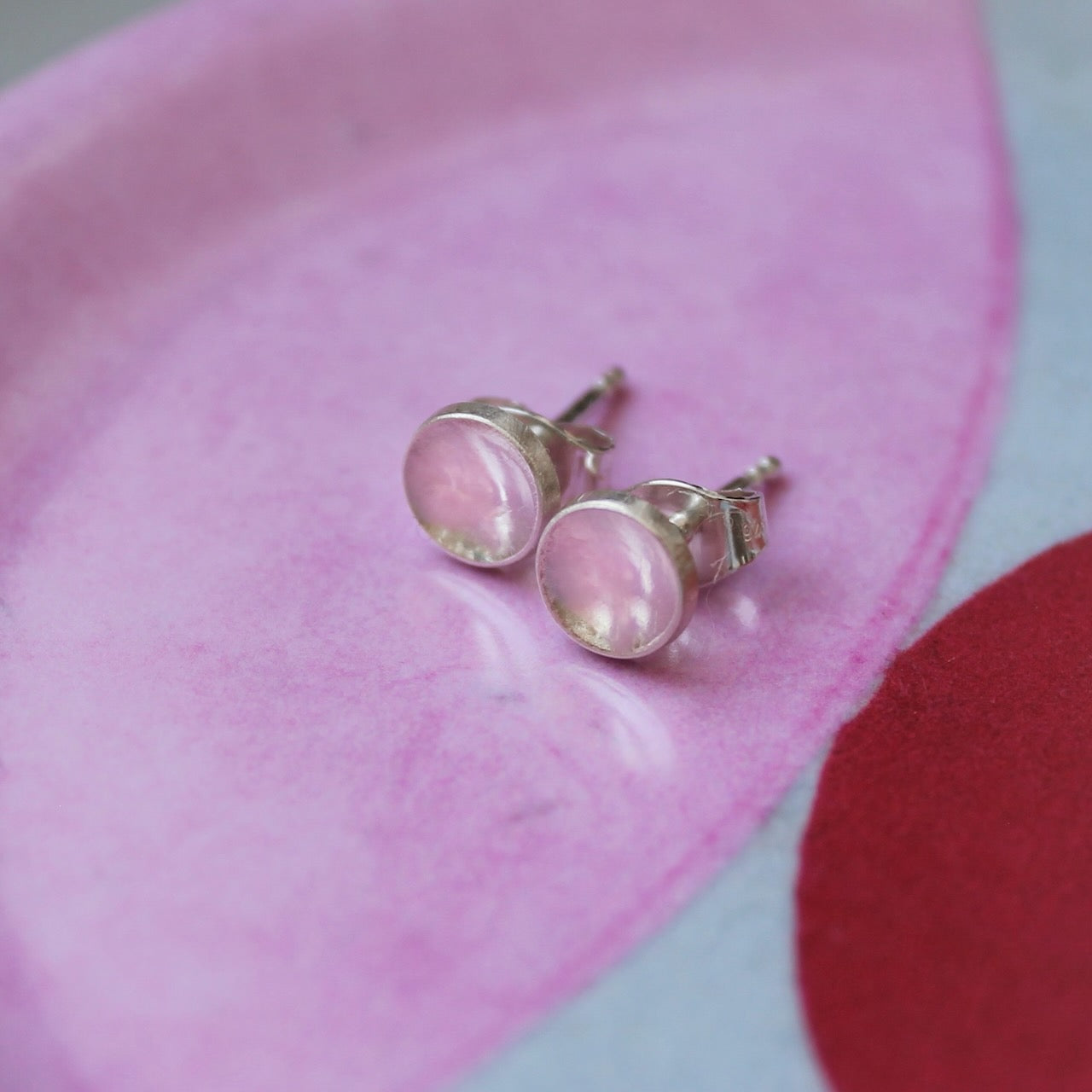 round elegant ear studs in polished sterling silver