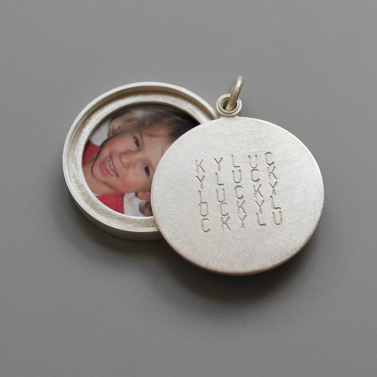 large sterling silver locket for two pictures typographic inscription