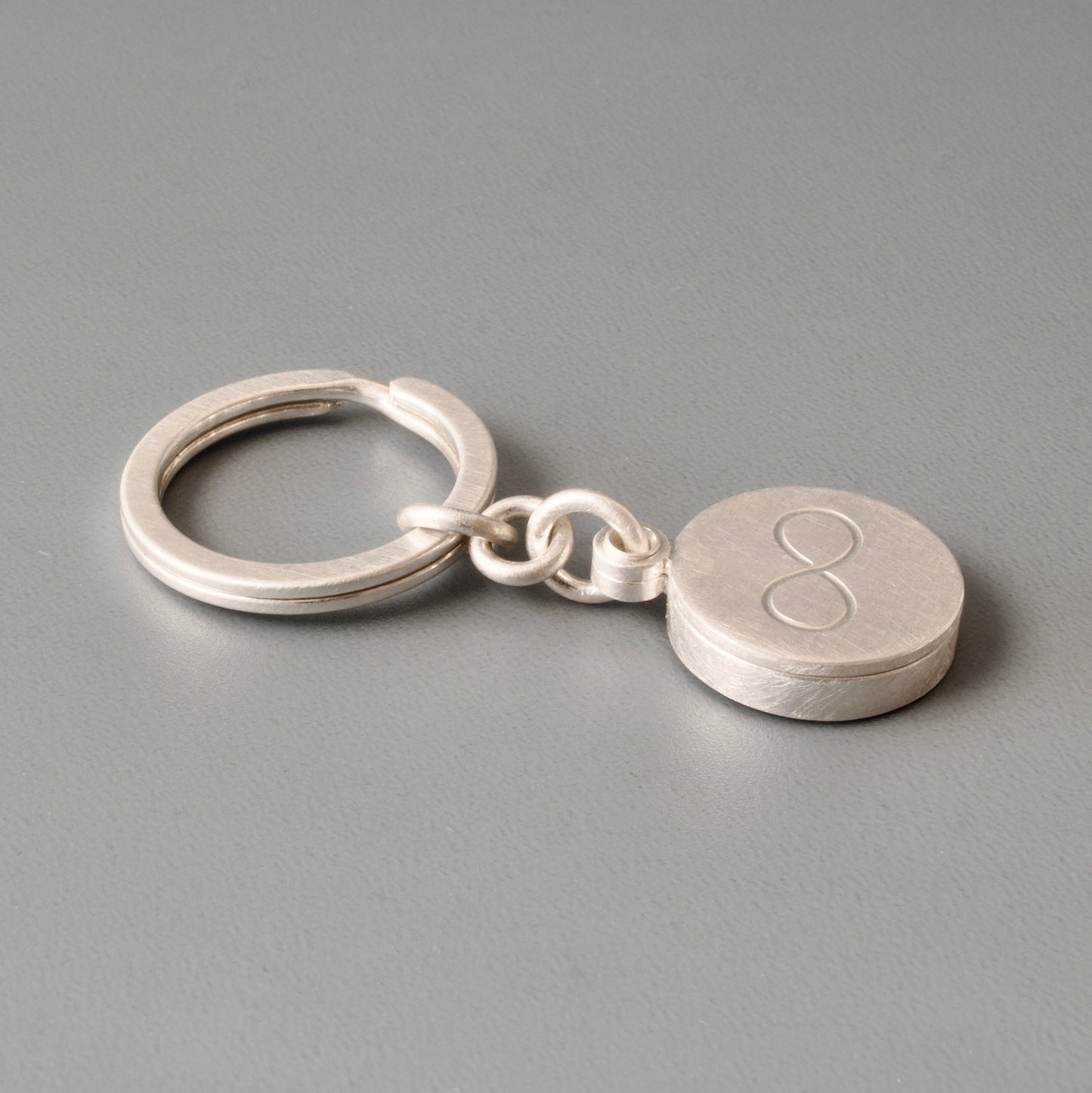 solid sterling silver keychain locket with infinity sign for one photo