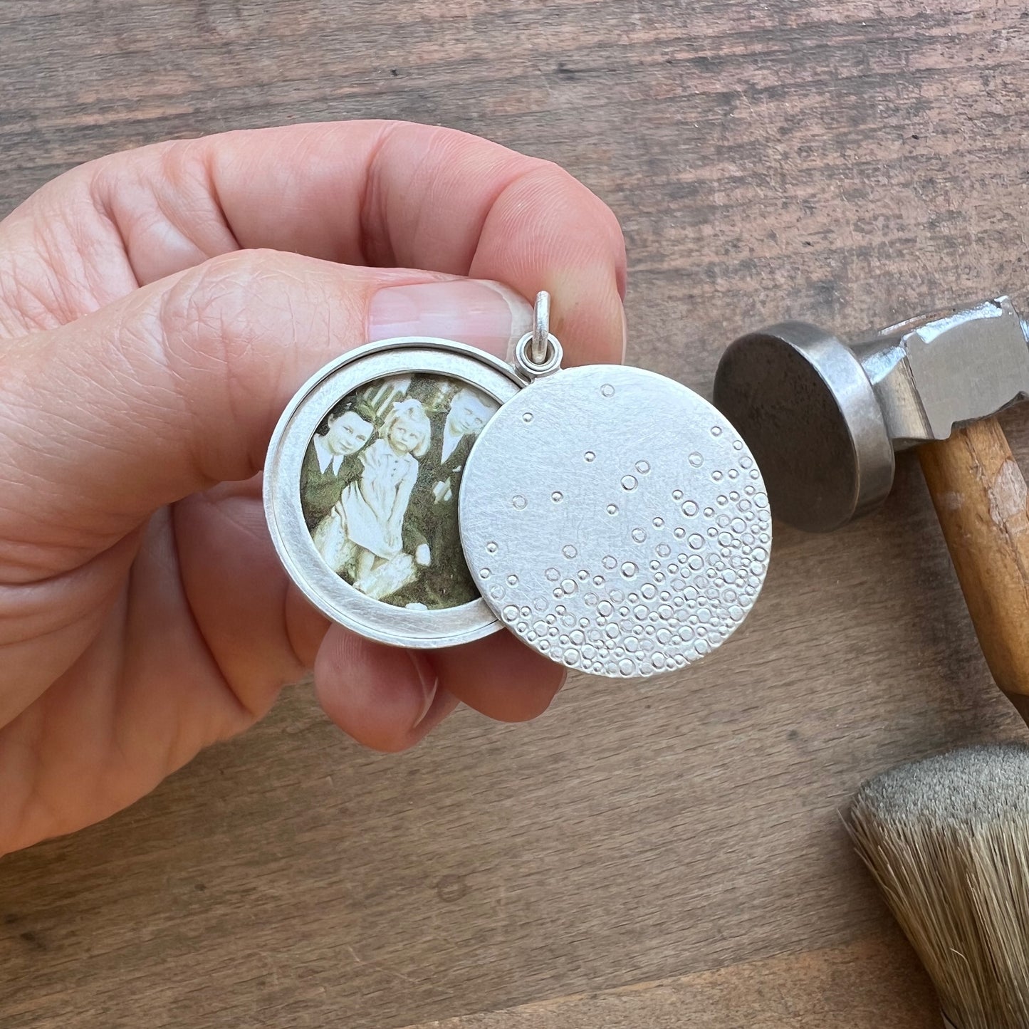 modern photo locket in sterling silver with bubbles design