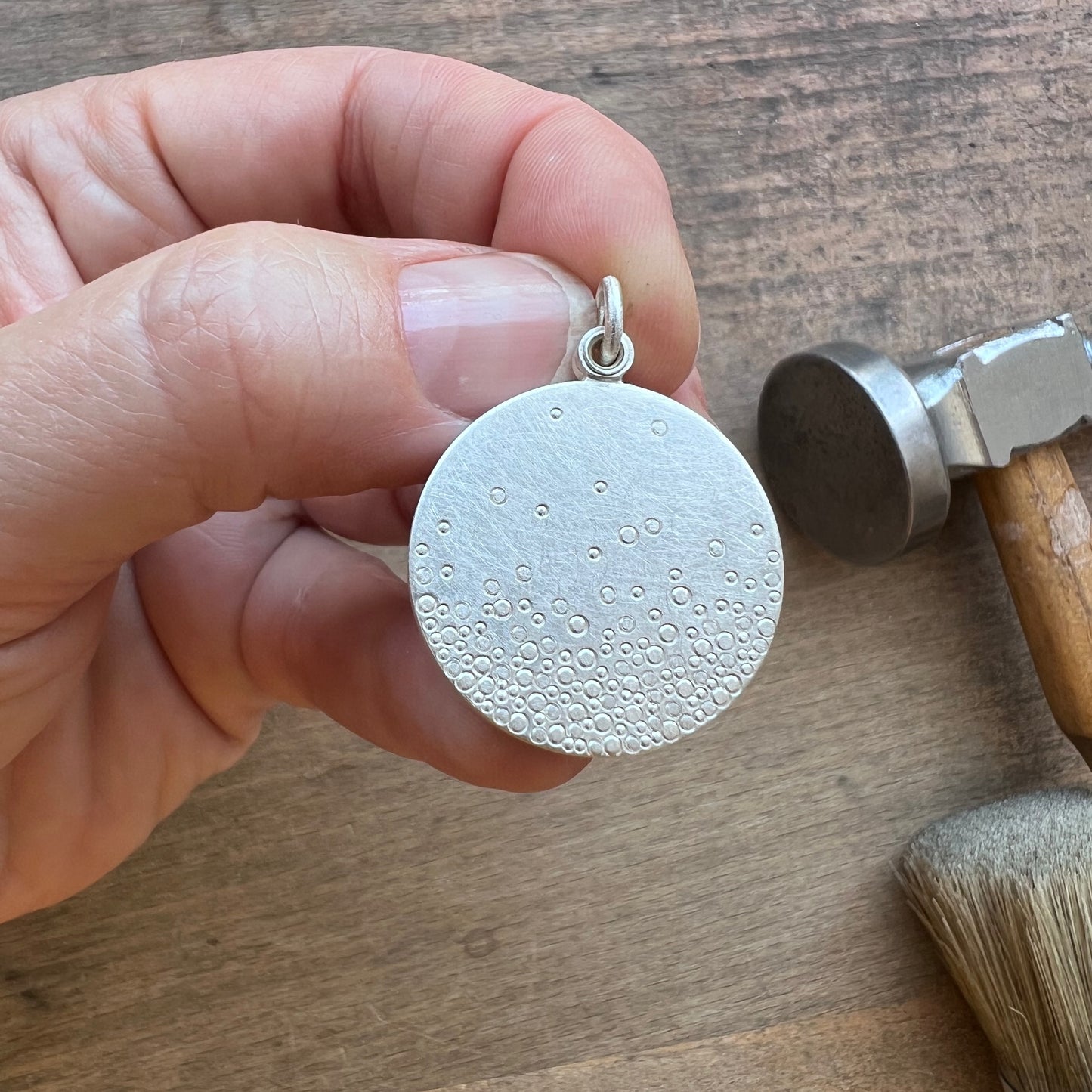 modern photo locket in sterling silver with bubbles design