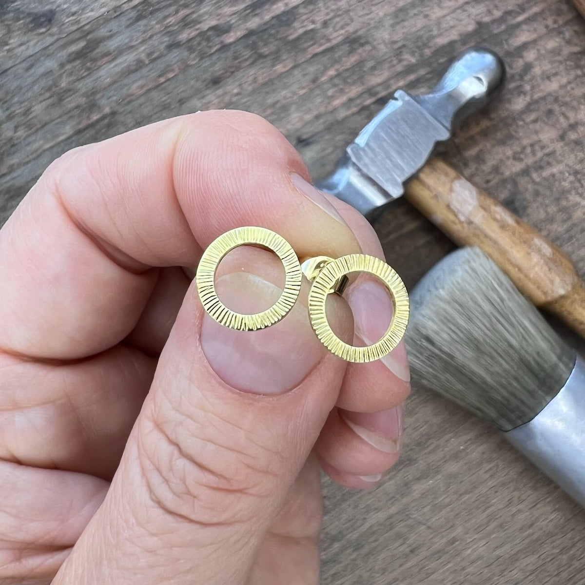 beautiful golden ear studs with hammered surface
