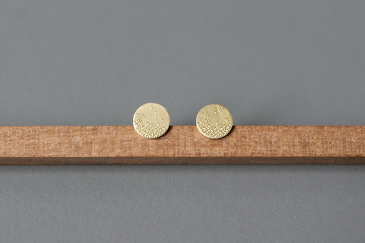 dainty golden ear studs with bubbles design