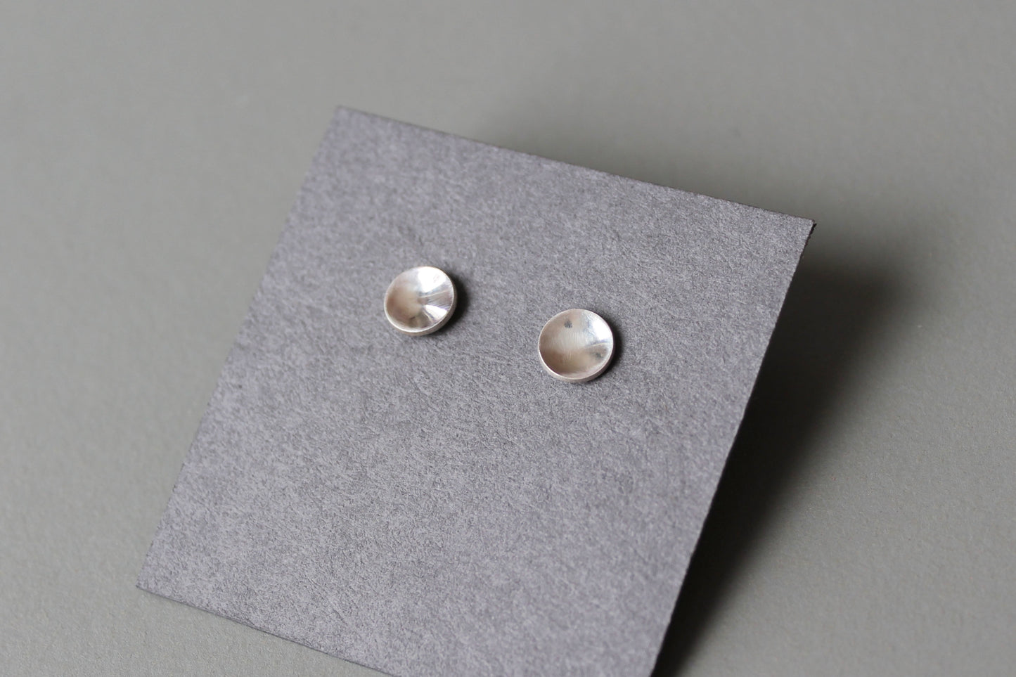 round elegant ear studs in polished sterling silver