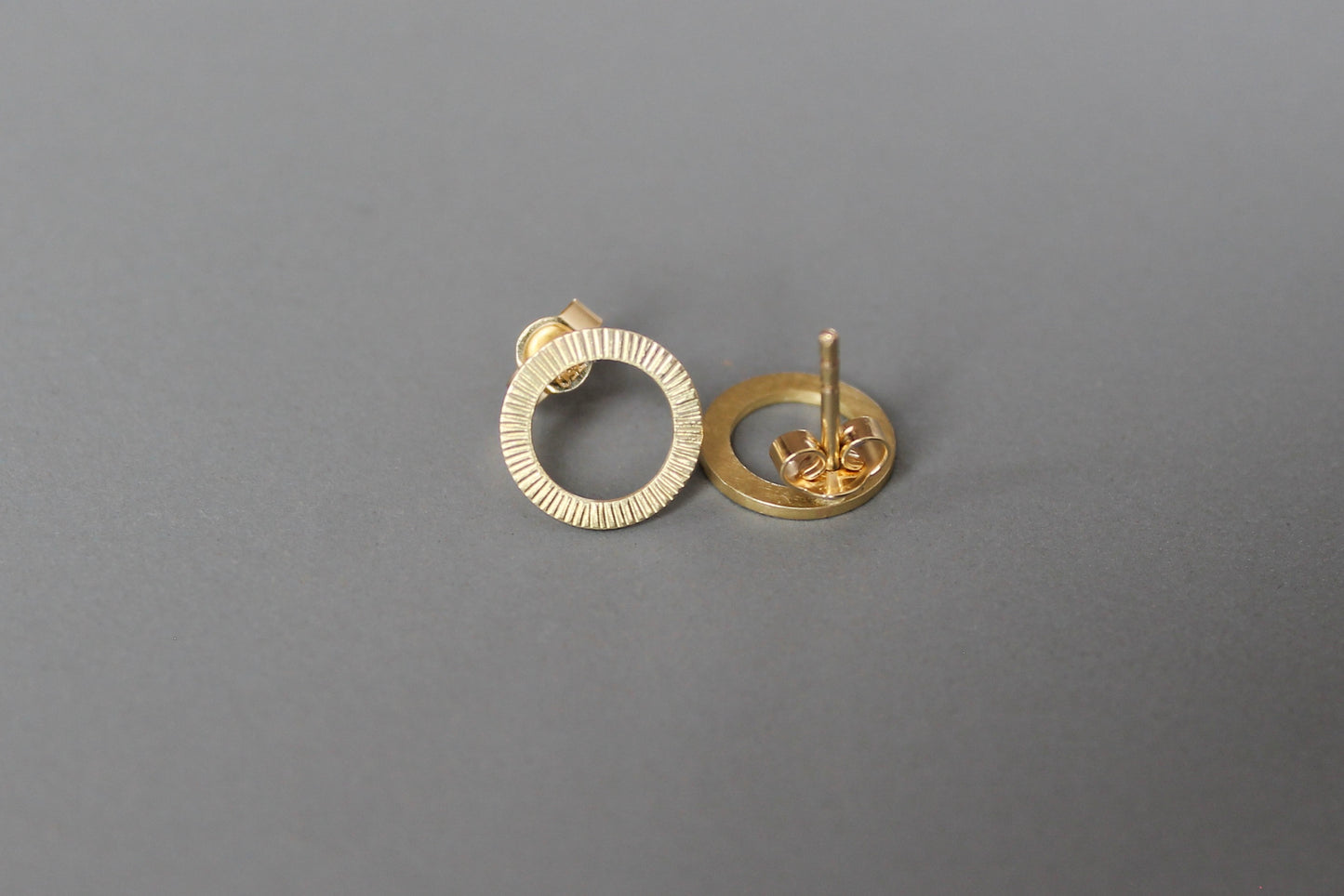 beautiful golden ear studs with hammered surface