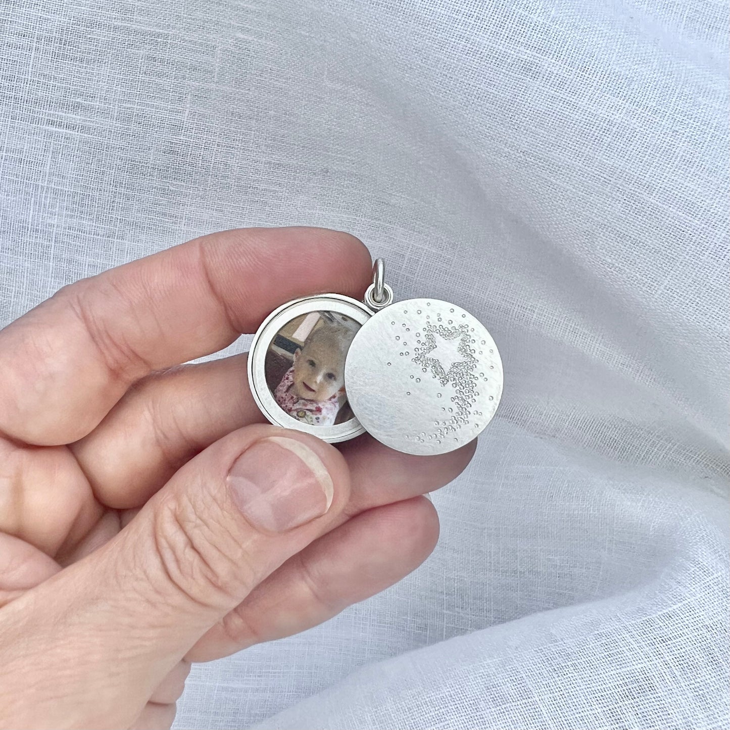 shooting star locket for two photos in sterling silver