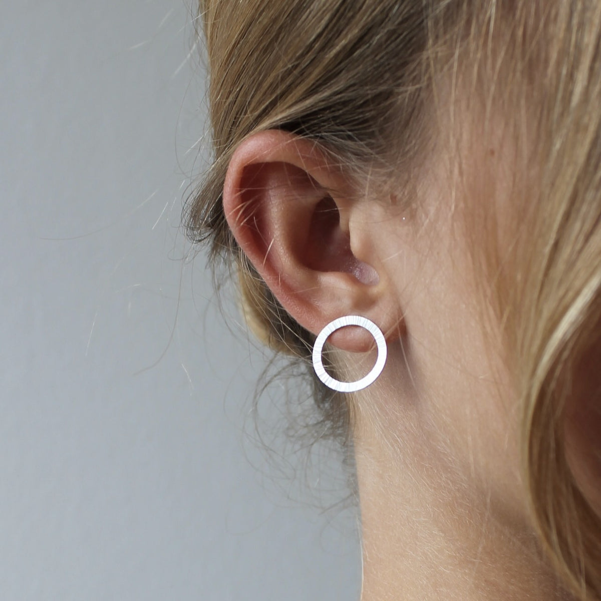 beautiful large aureole ear studs sterling silver with hammered surface