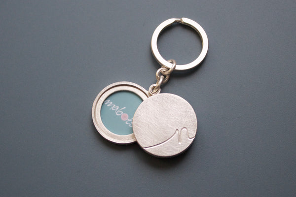 silver keychain locket for two pictures with personalized  initial