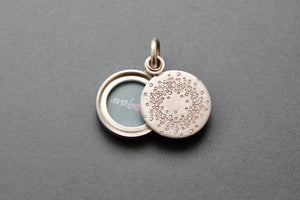 small mabotte locket for one photo in sterling silver with 1000 dots design