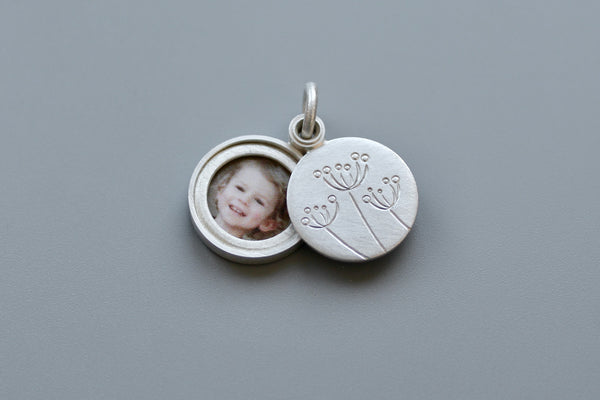 small floral locket for one picture in sterling silver