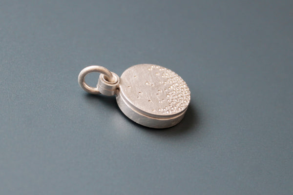 modern silver locket for one picture with bubbles design