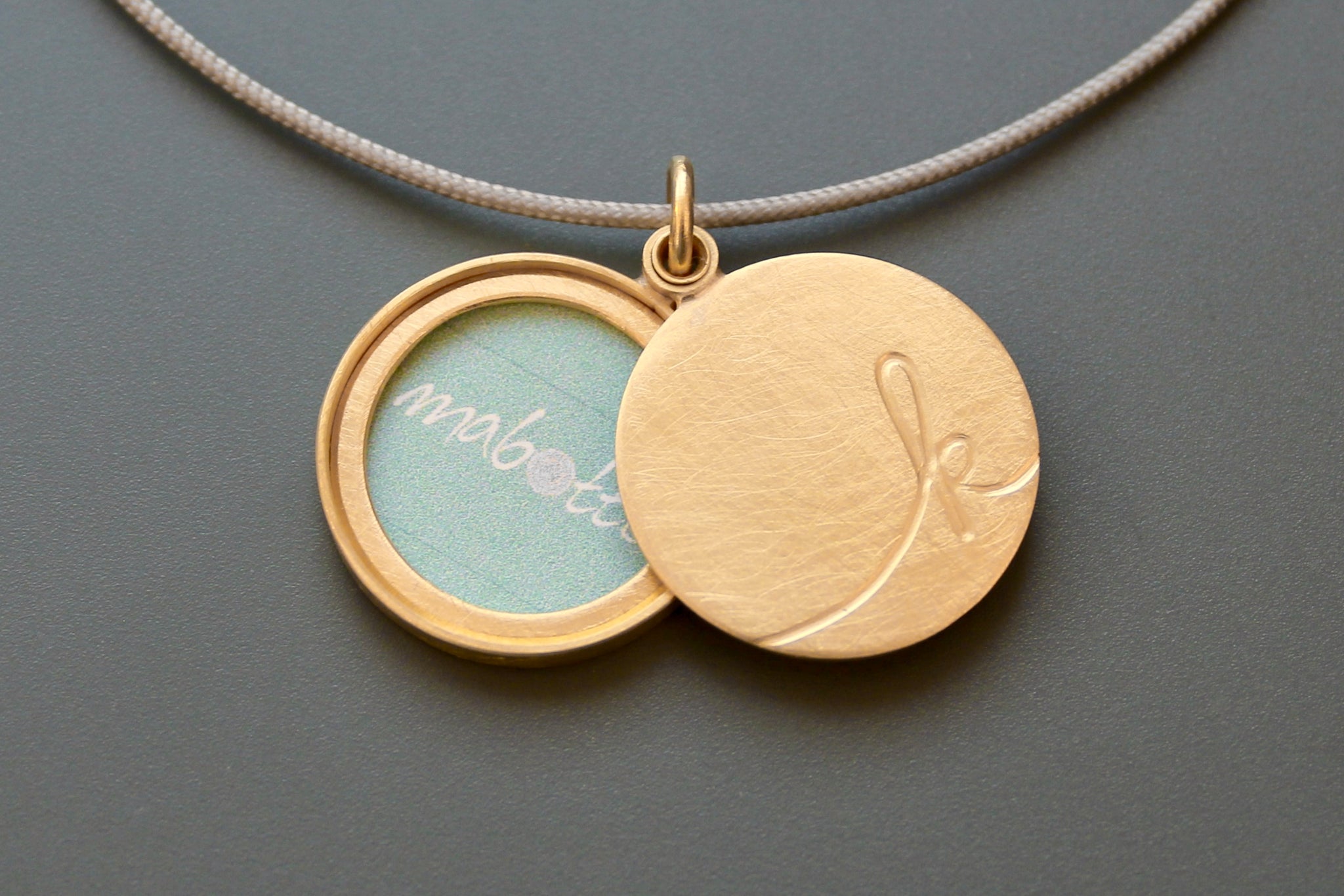 unique golden locket for one photo with custom initial