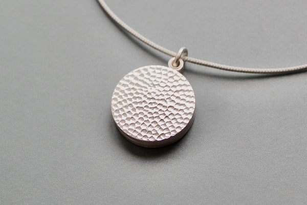 hammered modern locket for two photos in sterling silver