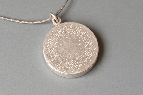 personalized glass locket in sterling silver with 1000 dots design