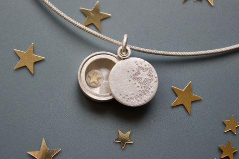romantic sterling silver glass locket with shooting star