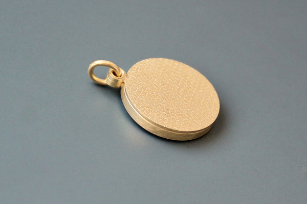 minimalist golden locket for one photo