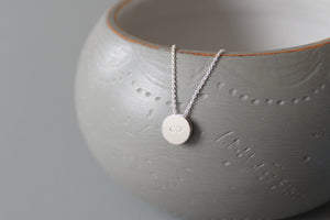 tiny pendant necklace in sterling silver with infinity symbol