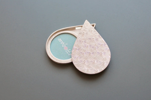 beautiful drop shaped picture locket in Sterling Silver with unique handmade pattern