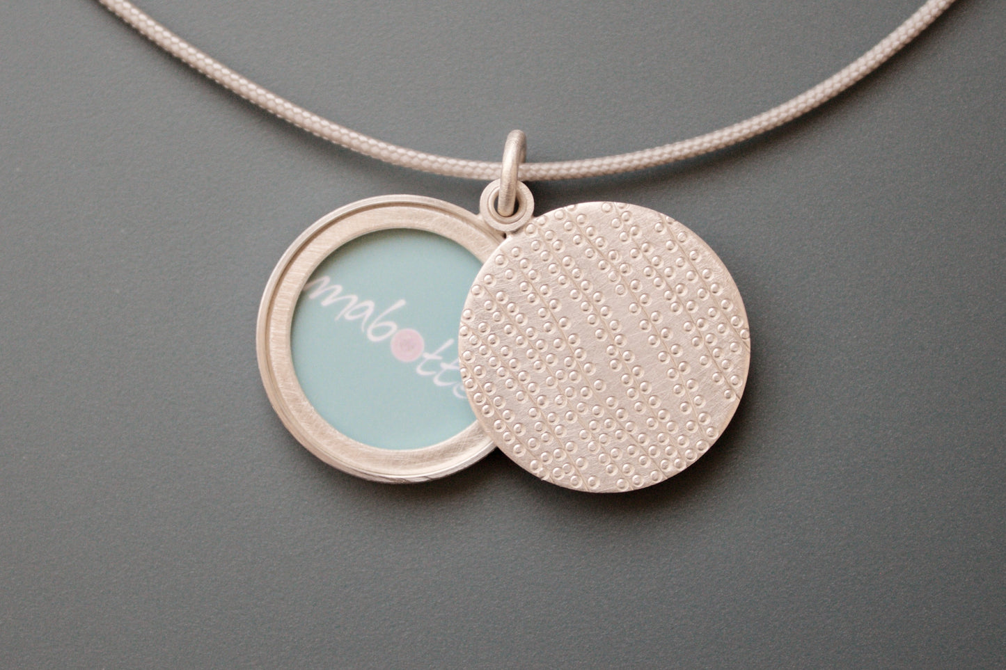 modern picture locket string of pearls design