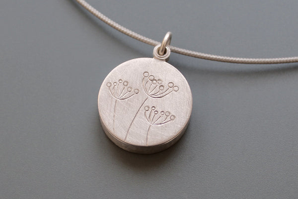 secret message locket filled with letter plates and a golden heart