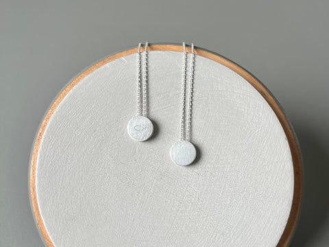 minimalist pendant necklace in sterling silver with fish symbol
