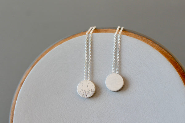 Tiny minimalist necklace in sterling silver with bubbles design
