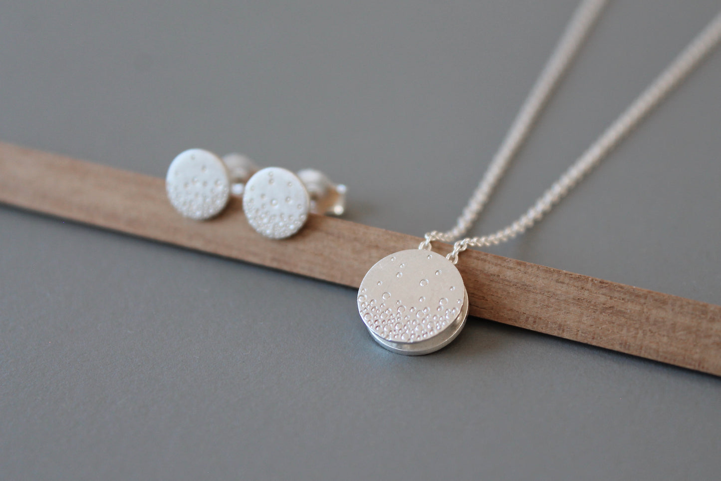 Tiny minimalist necklace in sterling silver with bubbles design