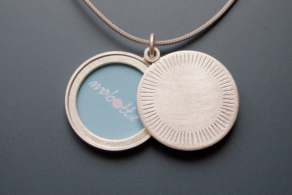 minimalist sterling silver round photo locket with aureole